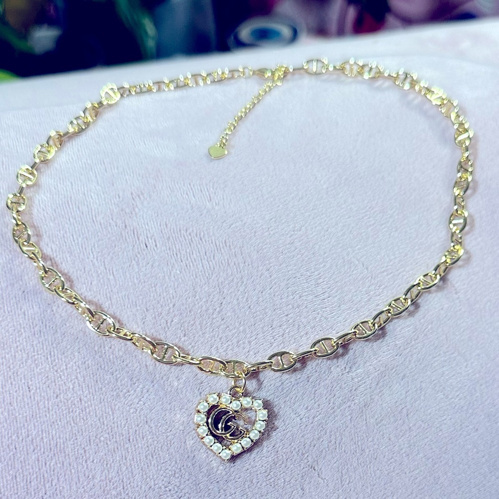 GUCCI Heart Pearl Zipper Pull Charm on an 18k Gold Plated Necklace